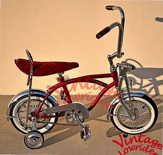 12" LOWRIDER BIKE CHROME/BURGUNDY METALLIC FRAME 72 SPOKE RIMS & LOWRIDER TIRES.